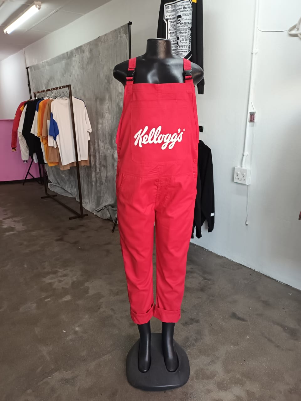 Kellogg's branded red overalls on a mannequin
