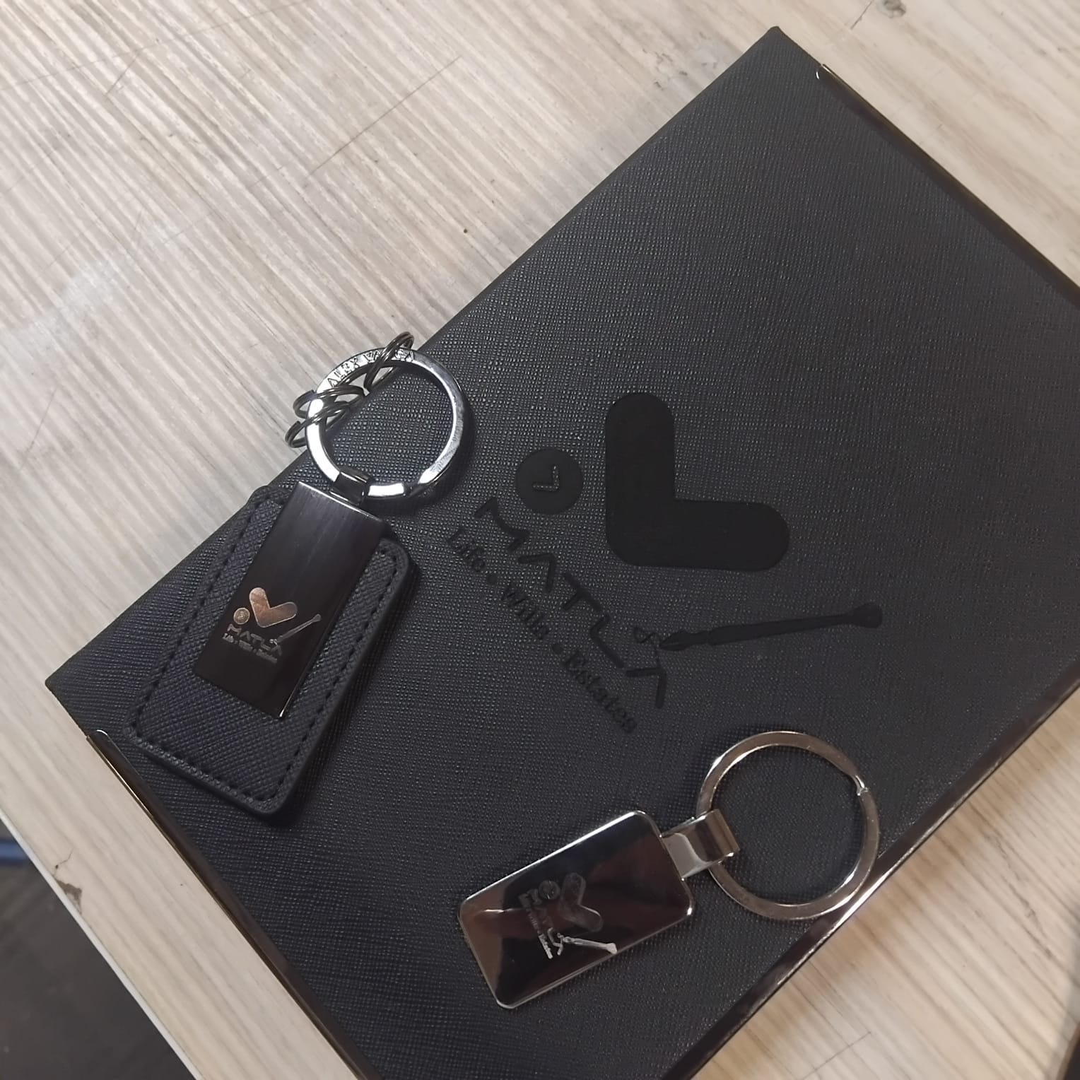 MATLA branded leather keychains in a gift box