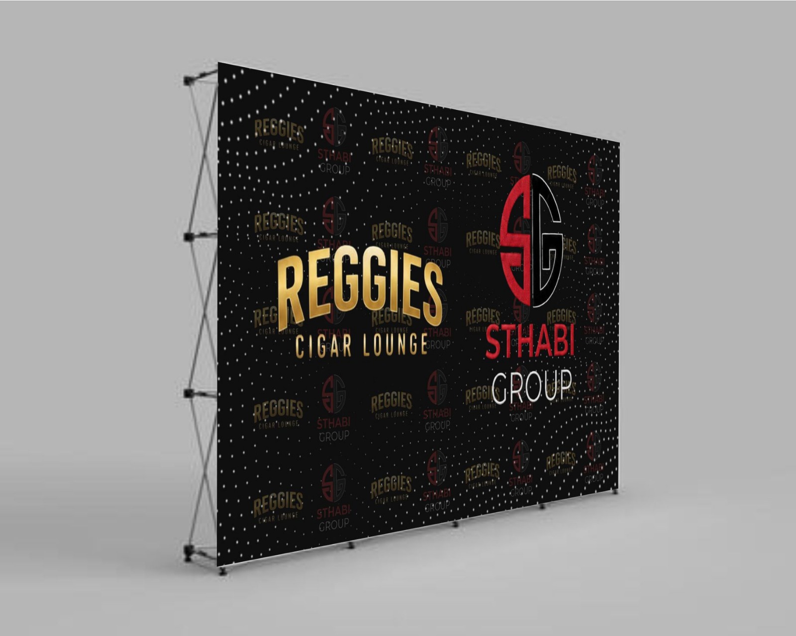 Reggies Cigar Lounge and Sthabi Group step-and-repeat backdrop